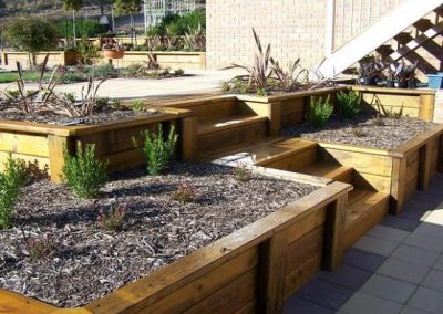 Timber stained retaining walls
