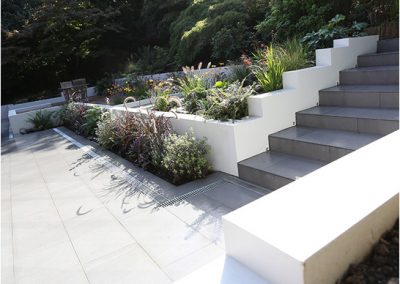 Rendered stepped retaining walls